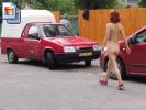 Red shoe hottie walks around naked in town (Galleries)