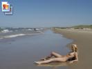 Very hot blonde girl flashing fully nude on the beach (Galleries)