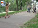 Red shoe hottie walks around naked in a park (Galleries)